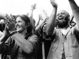 Jean and Michael Eavis cheer from the Pyramid Stage, 1992. 