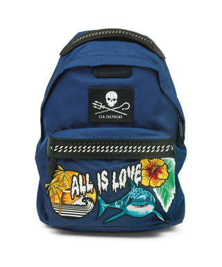 Blue backpack with a skull and crossbones patch, shark patch, palm tree and wave patch, and patch saying 'ALL IS LOVE'