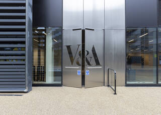 A double folding door opens 