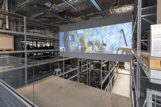 a projection screen showing a video 