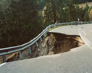 Landslide with part of road missing 